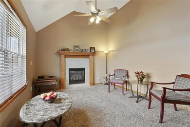 Vaulted great room greets you as you walk in the f