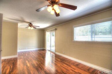 Brazilian Kai Flooring in Living Room Hall and Bed