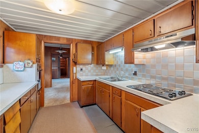 The newly updated cooktop is a wonderful accent to the classic checkered metal backsplash also recently added to the​​‌​​​​‌​​‌‌​​​‌​​‌‌​​‌‌​‌​​​‌‌​​‌​​​​​‌ space.