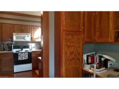 View from office into kitchen.  Notice the hardwoo
