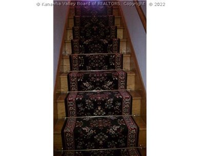 Exterior Front. Staircase leading to 3 bedrooms &
