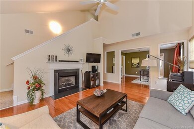 great room w/gas fireplace & mounted TV that remai