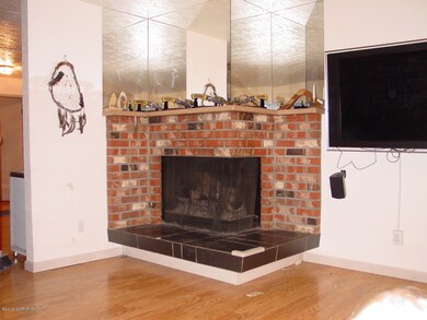Living Room  Corner Fireplace