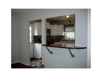 Breakfast Bar. Kitchen open to dining area with br