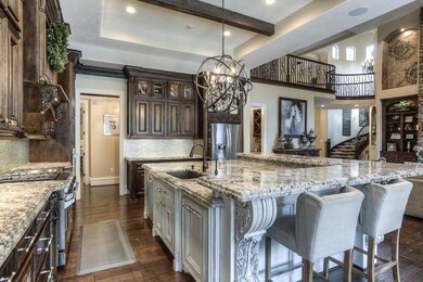 HUGE  CUSTOM KITCHEN MADE FOR ENTERTAINING. MASSIVE ISLAND W/ STORAGE