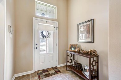 INVITING ENTRANCE FOYER WITH NEUTRAL COLORS, 11' C