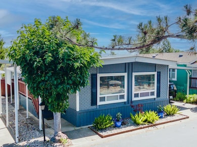 Located at back of park, large backyard, Water Views.  Double Pane Windows.