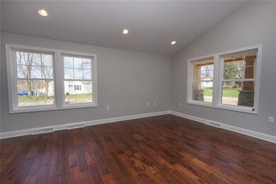 Let's start in the living room, beautiful hardwood