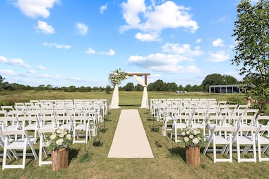 View of home's community featuring a yard