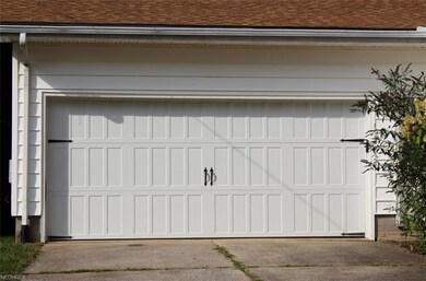 Stylish newer garage door.