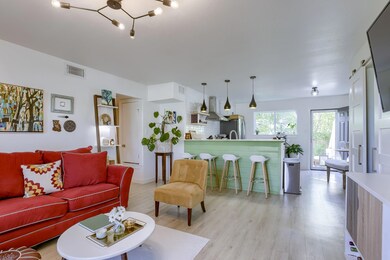 Living area with light wood-type flooring