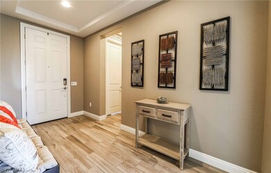 Formal entry * 9' ceilings * Stunning 'wood' plank