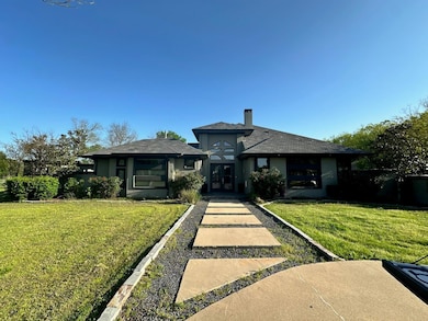 Prairie-style home featuring french doors, stucco 