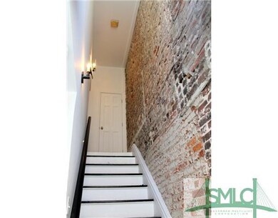 Other. This stairwell leads up to the upstairs uni