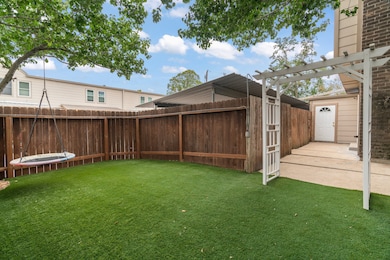Expansive backyard patio ideal for hosting gatheri