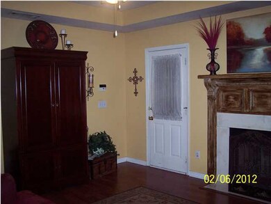 Beautiful fireplace with stained mantle!