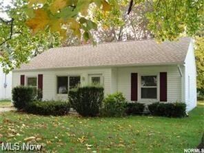 View of front of property with a front yard