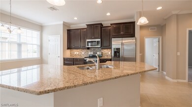 Kitchen is efficient yet roomy and is appointed wi