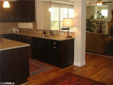 Kitchen - Hardwood floors, easy access from family