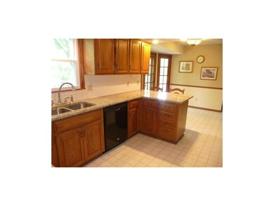 Very Large Kitchen with lots of cabinets and eat-i