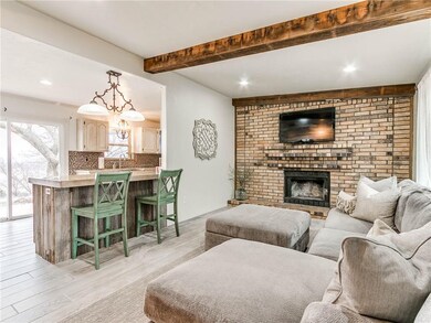 living room with brand new flooring, cozy fireplac