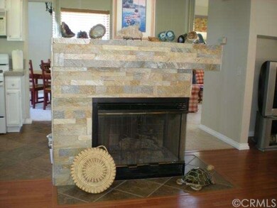 THE FIREPLACE IS IN THE CENTER OF THE HOME