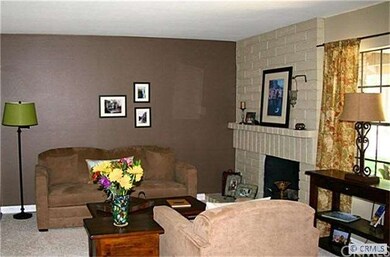 Living room.  Front window at right facing the Loo