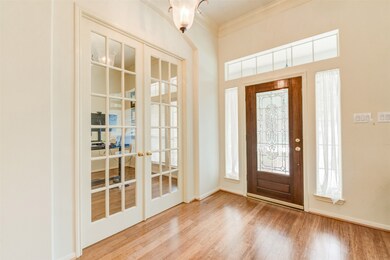 WARM ENTRYWAY WITH BEAUTIFUL FLOORING