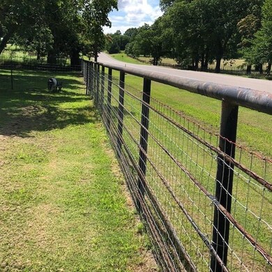 Pipe fencing along highway