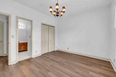 This home has two separate, private BR's.  This room would be considered the primary BR with access to it's own private bath.