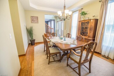 The dining room has a tray ceiling.