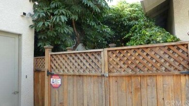 Fence to back yard.