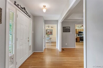 Large open foyer; hardwood floors.