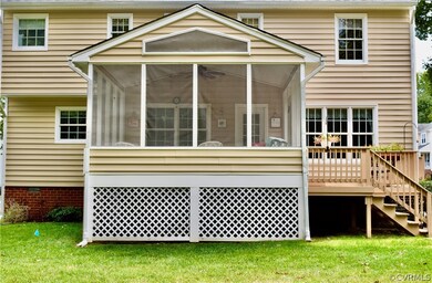 Screen porch with attached deck. Vinyl inside and