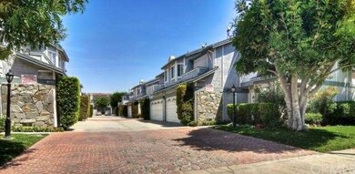 Well maintained landscaped entrance. 
