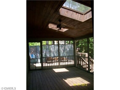 Exterior Front - Screen porch with skylights and c