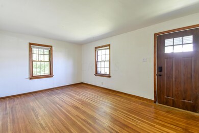 family room with new front door