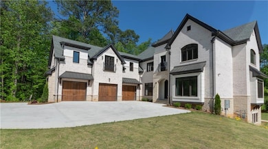View of front of house with a front lawn, a standi
