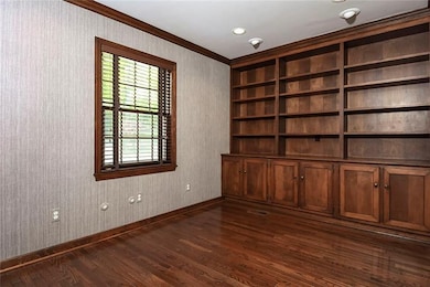 Convenient First Floor Den with Built-In Bookcases