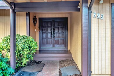 Covered patio and double door entry