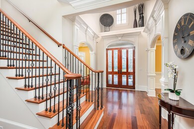 Elegant Foyer with Soaring Ceilings