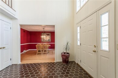 2 story foyer. Entrance to formal dining room.5 Wa