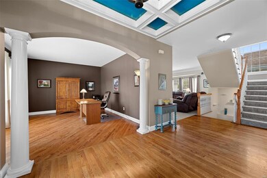 Entry looking into office and family room.