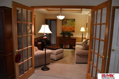 Formal dining room is currently used as a sitting room.