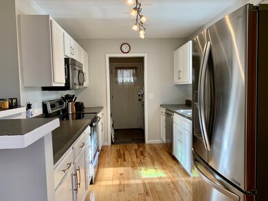 Kitchen to Laundry Room and Door to Carport
