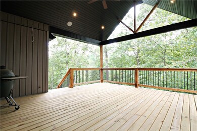 Plenty of privacy on this beautiful covered back patio that is wired for sound!