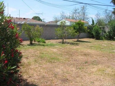 Large Rear Yard Surrounded With Block Walls