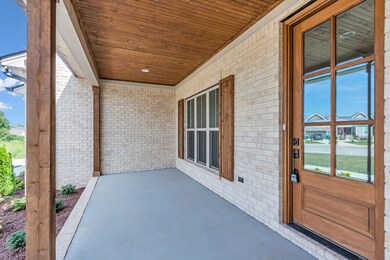 You will fall in LOVE! This porch is made for relaxing on warm summer evenings and/or cool fall nights.