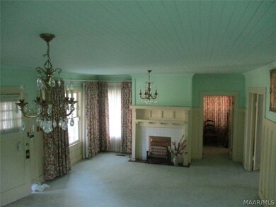 Living Room/ open door goes to bonus room/office