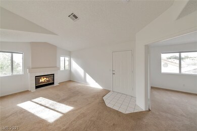Living Rm: Gas Fireplace, Front Door, Den/Office t